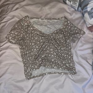 scrunched cream and white crop top